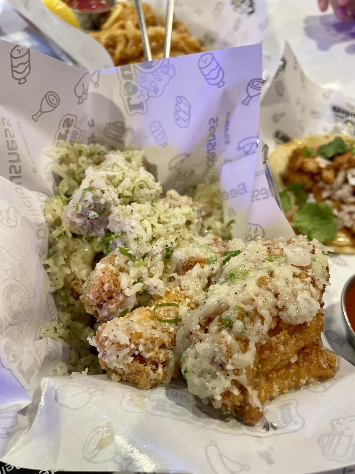 The garlic cheese wings from Louders in Koreatown.