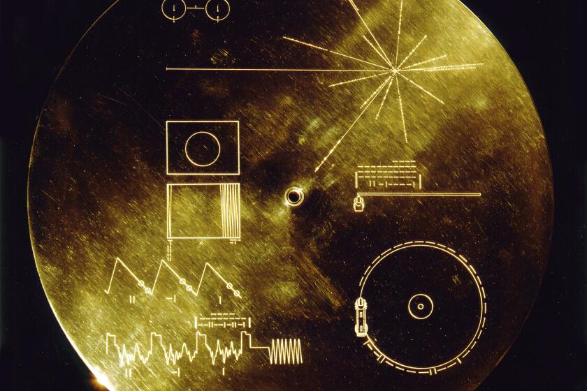 The Sound of Earth record cover, 1977. This gold aluminum cover was designed to protect the Voyager 1 and 2. Sounds of Earth gold-plated records from micrometeorite bombardment, but also serves a double purpose in providing the finder a key to playing the record. The explanatory diagram appears on both the inner and outer surfaces of the cover, as the outer diagram will be eroded in time. Flying aboard Voyagers 1 and 2 are identical golden records, carrying the story of Earth far into deep space. The 12 inch gold-plated copper discs contain greetings in 60 languages, samples of music from different cultures and eras, and natural and man-made sounds from Earth.