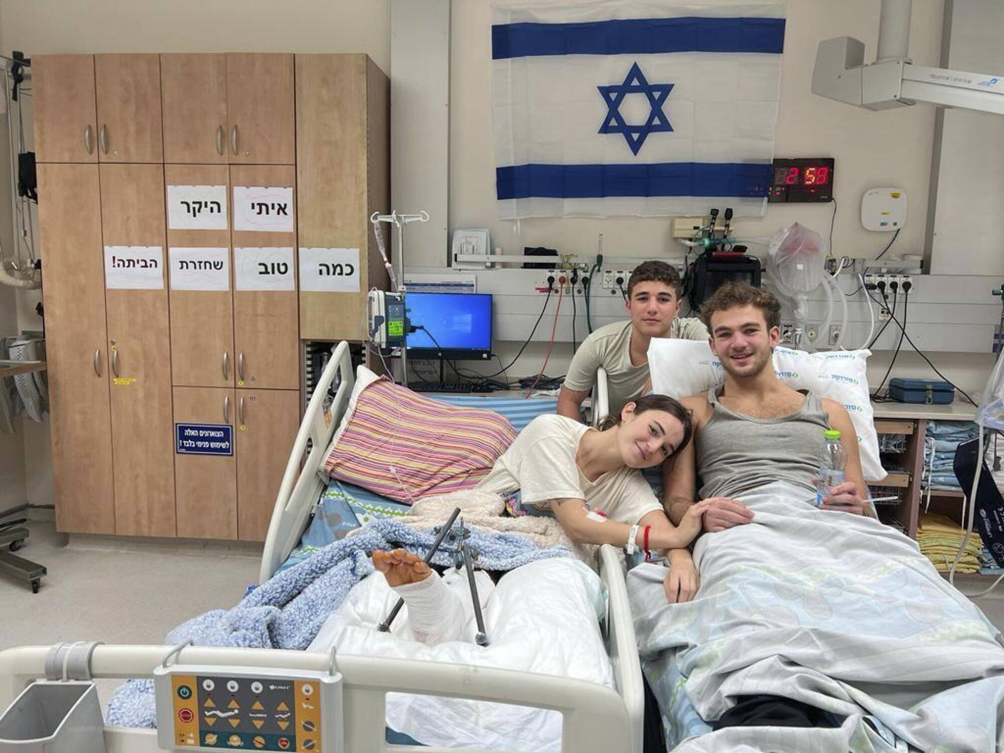 Brother and sister, who were released from captivity in Gaza, in an Israeli hospital