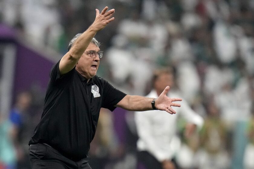 Mexico's head coach Gerardo Martino gestures during the World Cup group C soccer match between Saudi Arabia and Mexico, at the Lusail Stadium in Lusail, Qatar, Wednesday, Nov. 30, 2022. (AP Photo/Moises Castillo)
