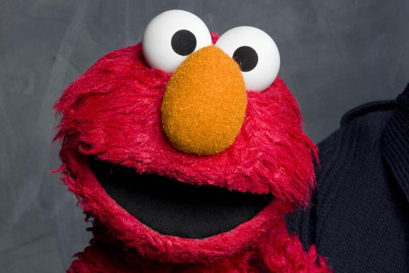 A close-up on Elmo, the red muppet with an orange nose who stars in "Sesame Street"