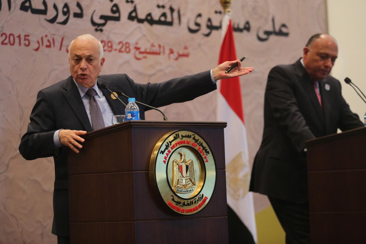 Arab League Secretary-General Nabil Elaraby, left, and Egyptian Foreign Minister Sameh Shukri hold a news conference at the conclusion of the Arab summit in Sharm el Sheik on March 29.