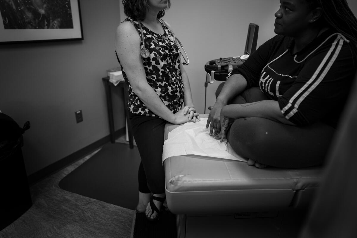 The doctor consults with a patient on options for abortion at the clinic in Dallas. (Gina Ferazzi / Los Angeles Times)