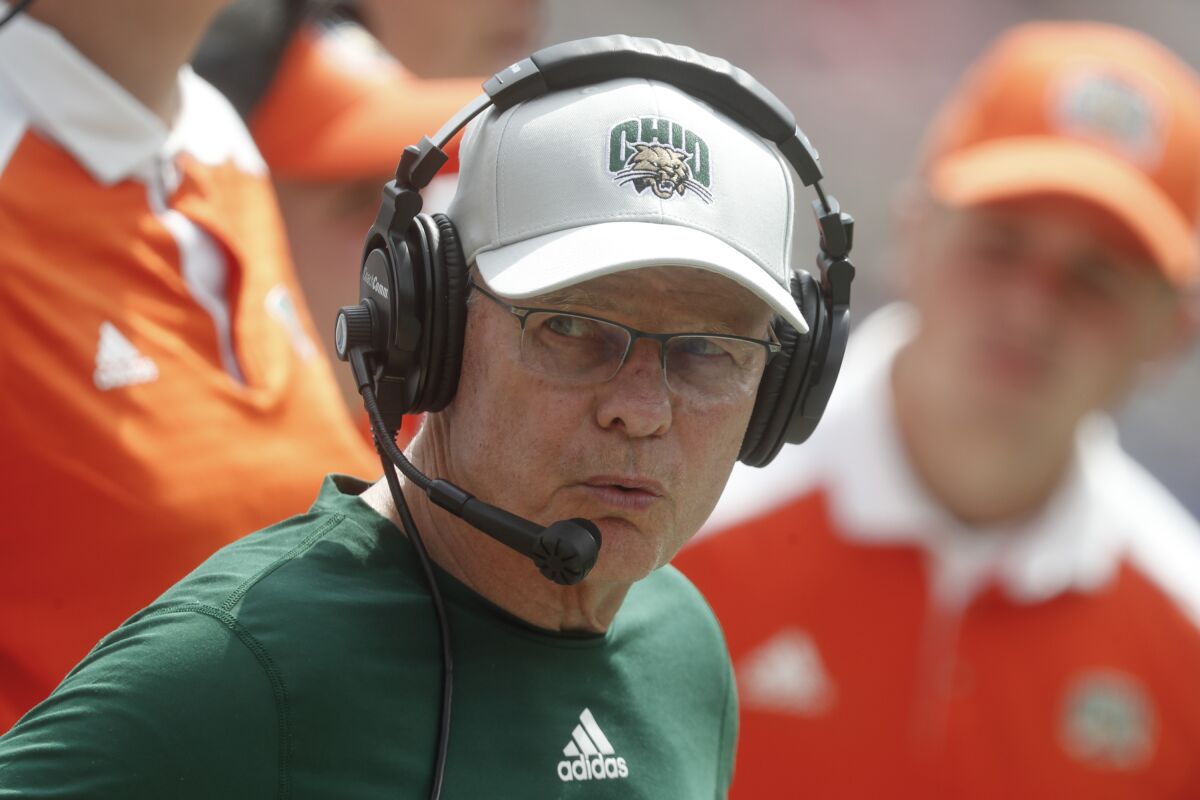 FILE - Ohio head coach Frank Solich watches along the sideline as his team plays against Pittsburgh during the second half of an NCAA college football game in Pittsburgh, in this Saturday, Sept. 7, 2019, file photo. Ohio coach Frank Solich is retiring after leading the program through 16 seasons of unprecedented success to “focus on his health,” the school said Wednesday, July 14, 2021. The school announced that Solich was stepping down less than two months before the start of the season and his 77th birthday. Offensive coordinator Tim Albin was promoted to head coach. (AP Photo/Keith Srakocic)