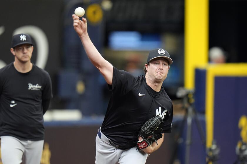 New York Yankees pitcher Gerrit Cole throws a bullpen session before a baseball game against the Tampa Bay Rays, Saturday, May 11, 2024, in St. Petersburg, Fla. (AP Photo/Chris O'Meara)