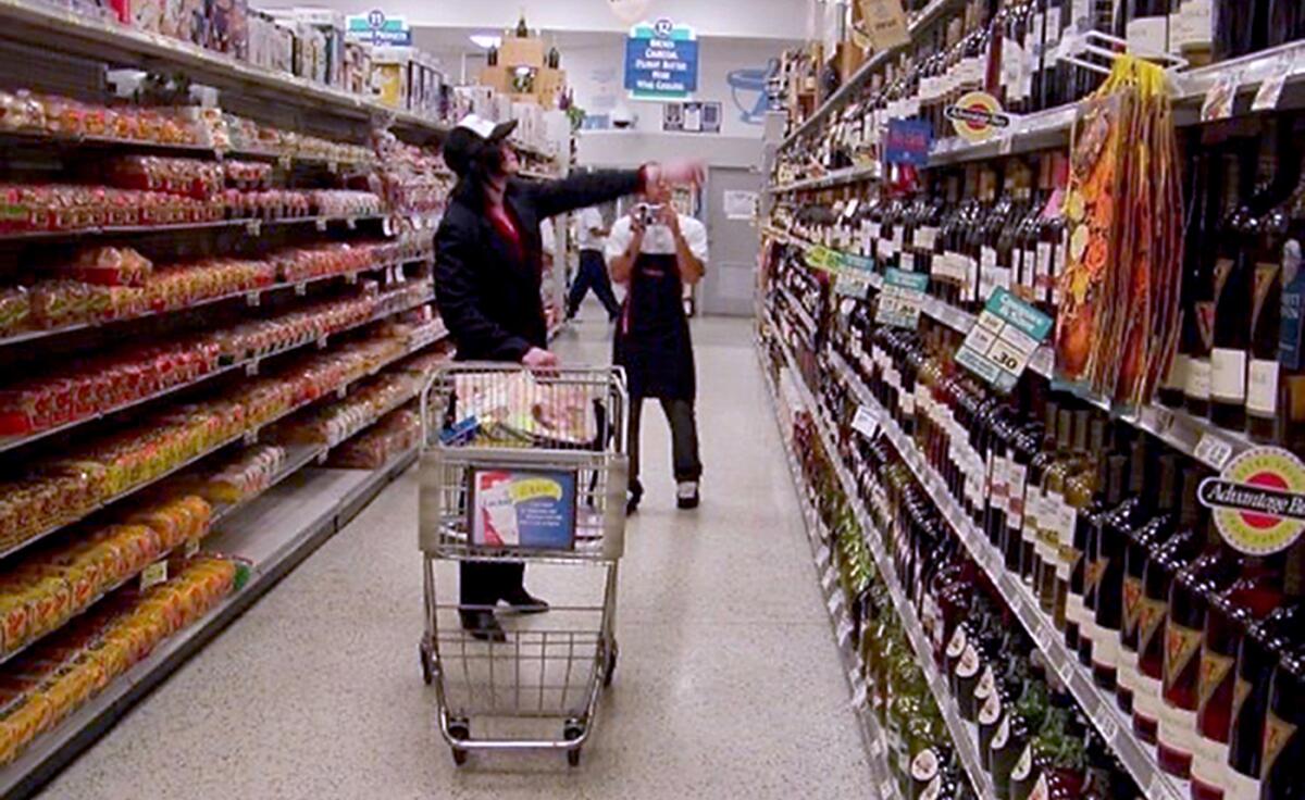 Michael Jackson shops at a grocery store in 2003.