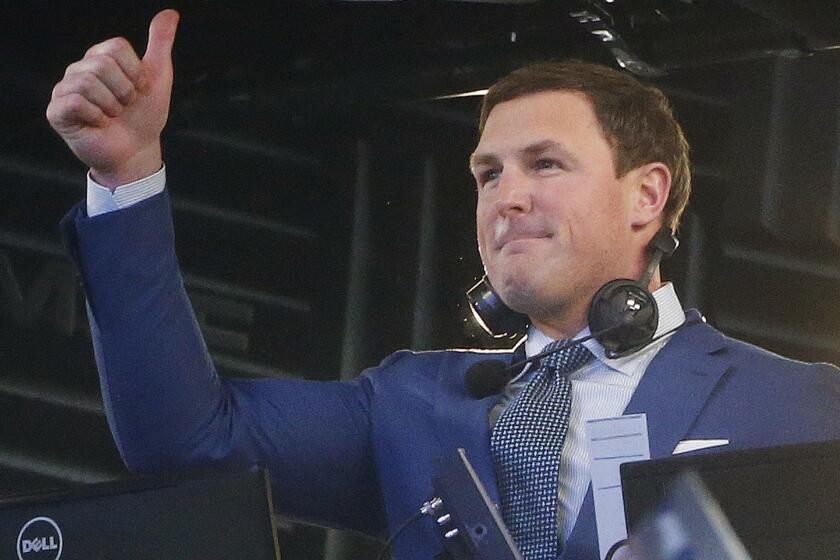 FILE - In this Nov. 5, 2018, file photo, former NFL player Jason Witten and broadcaster is recognized by the Dallas Cowboys before the first half of an NFL football game between the Cowboys and the Tennessee Titans in Arlington, Texas. Witten is coming out of retirement and rejoining the Cowboys after one season as a television analyst. The Cowboys announced Thursday, Feb. 28, 2019, that the 11-time Pro Bowl tight end had agreed to a one-year contract. (AP Photo/Michael Ainsworth, File)