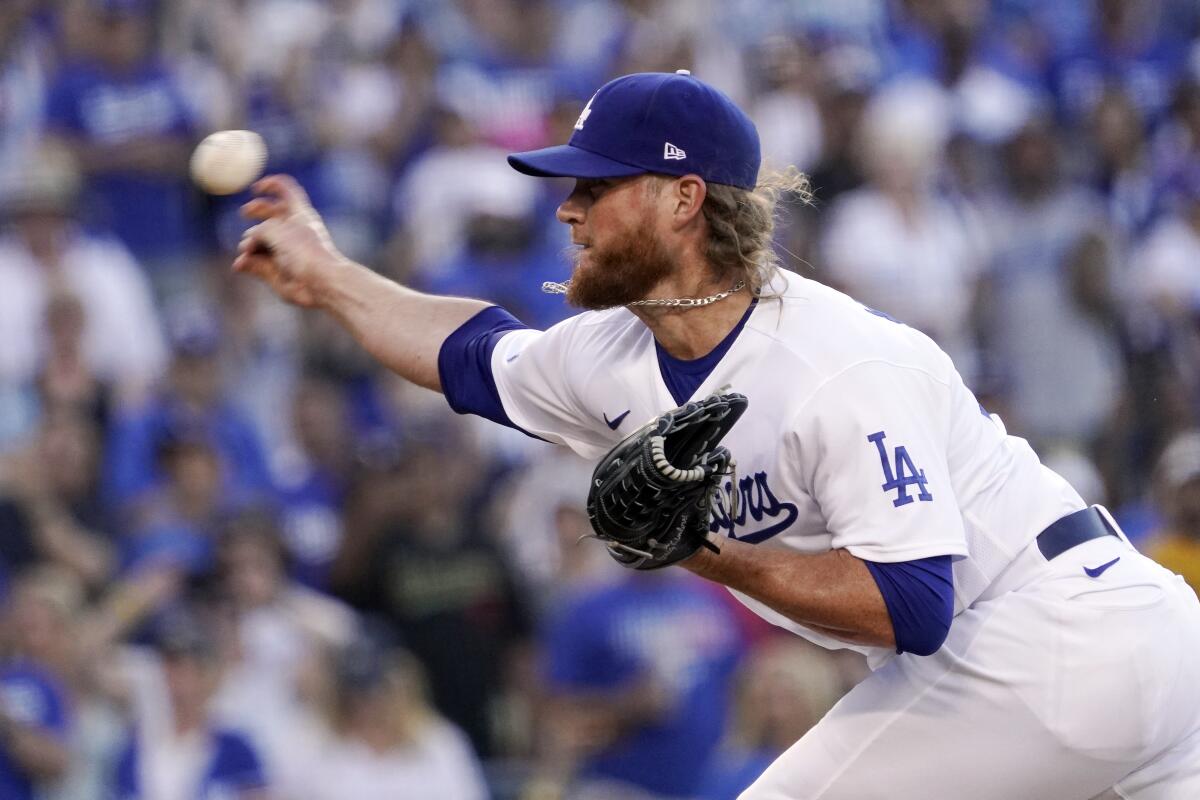 Dodgers reliever Craig Kimbrel delivers against the San Diego Padres on Sunday.
