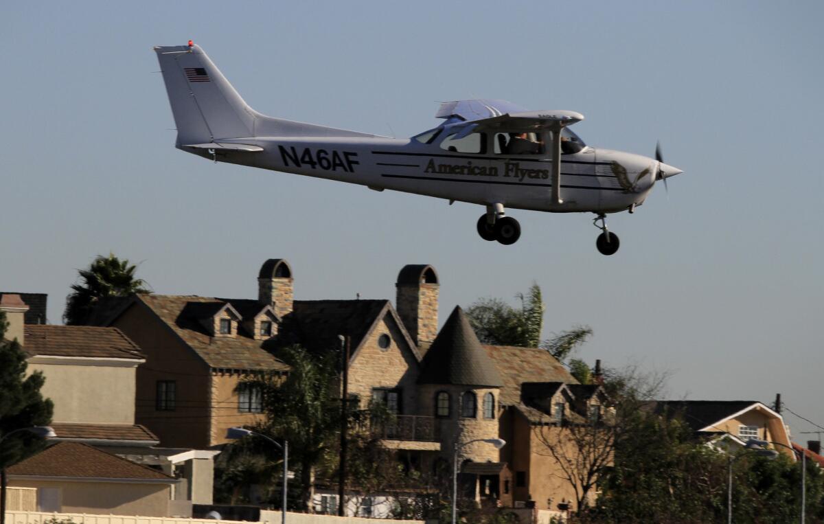 A small plane from American Flyers, a flight school, comes in for a landing at Santa Monica Municipal Airport.
