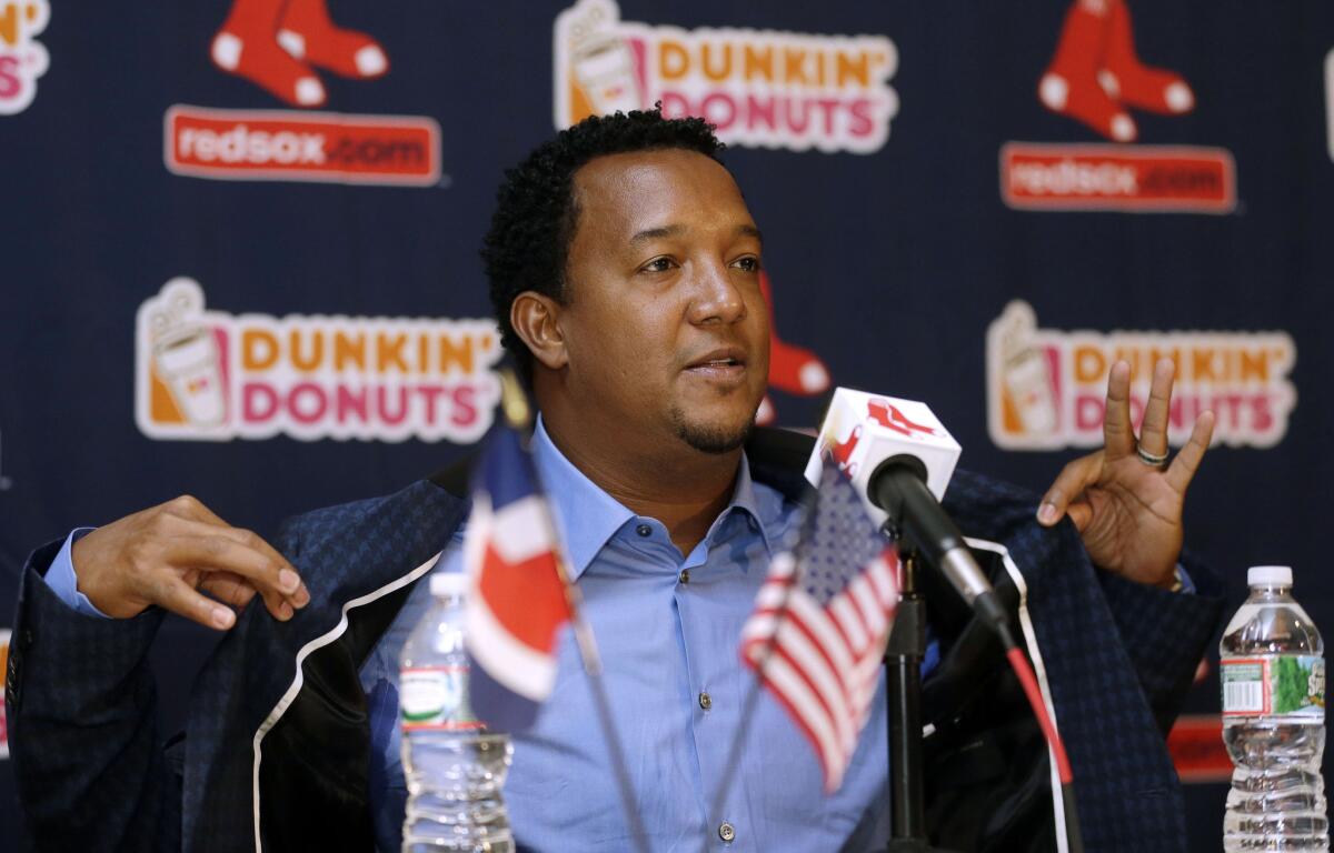 Former Boston Red Sox pitcher Pedro Martinez speaks at a new conference Tuesday after being elected to the Baseball Hall of Fame.