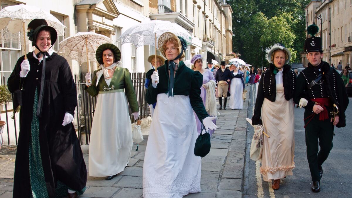 People dressed in period costume for the Jane Austen Festival in Bath, England. (Owen Benson / VisitEngland)