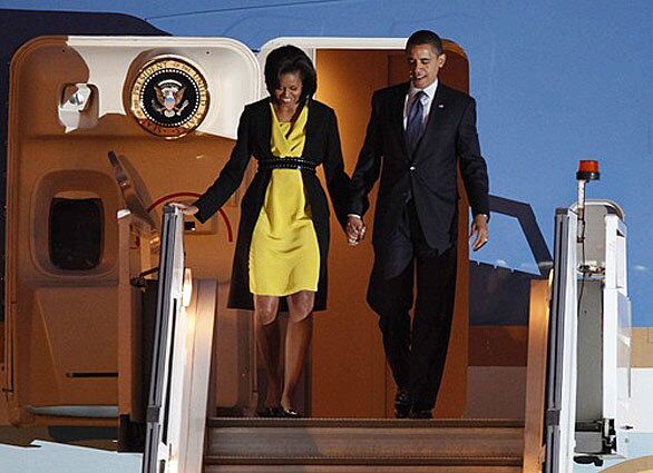 Upon landing in Essex, England, on March 31, 2009, the first lady steps out in a chartreuse dress designed by Jason Wu, a name that became familair to FLOTUS fashion followers.