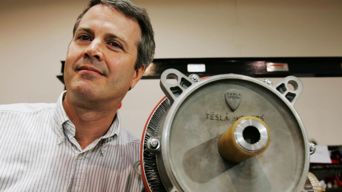 Martin Eberhard, a co-founder of Tesla Motors, poses next to an electric motor in 2006. Eberhard is chief innovation officer and chief scientist of SF Motors, a China-owned start-up that bought a former Humvee plant in Indiana.
