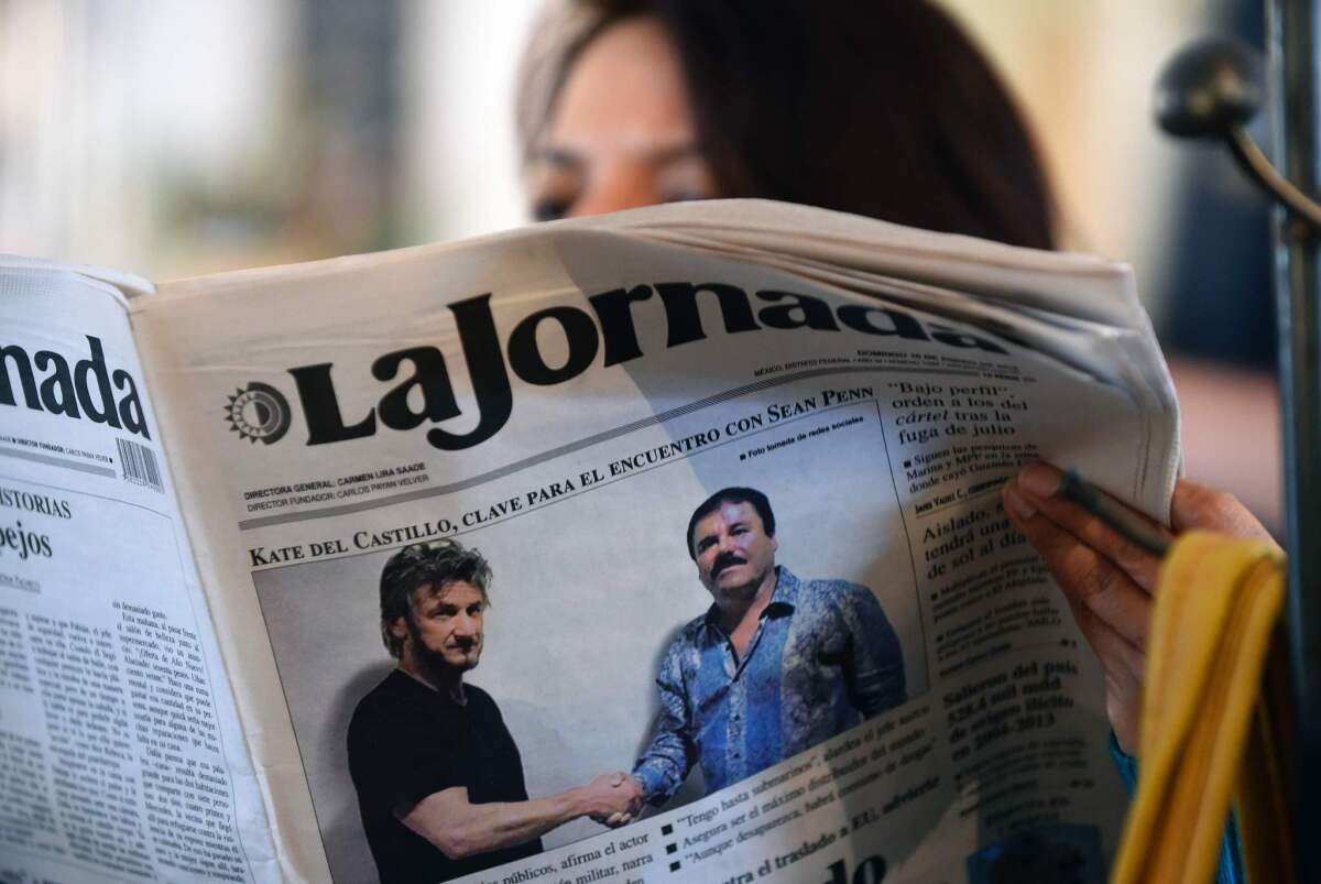 A woman reads a La Jornada newspaper in Mexico City on January 10 showing a picture of drug lord Joaquin "El Chapo" Guzman with Sean Penn.