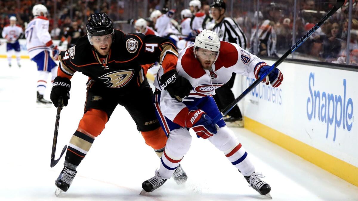 The Ducks' Cam Fowler pushes Montreal's Paul Byron on Nov. 29 at the Honda Center.