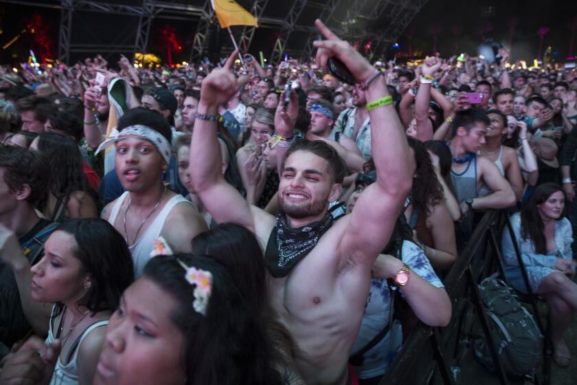 Porter Robinson gets the crowd going in the Sahara Tent at the Coachella Valley Music and Arts Festival on April 10.