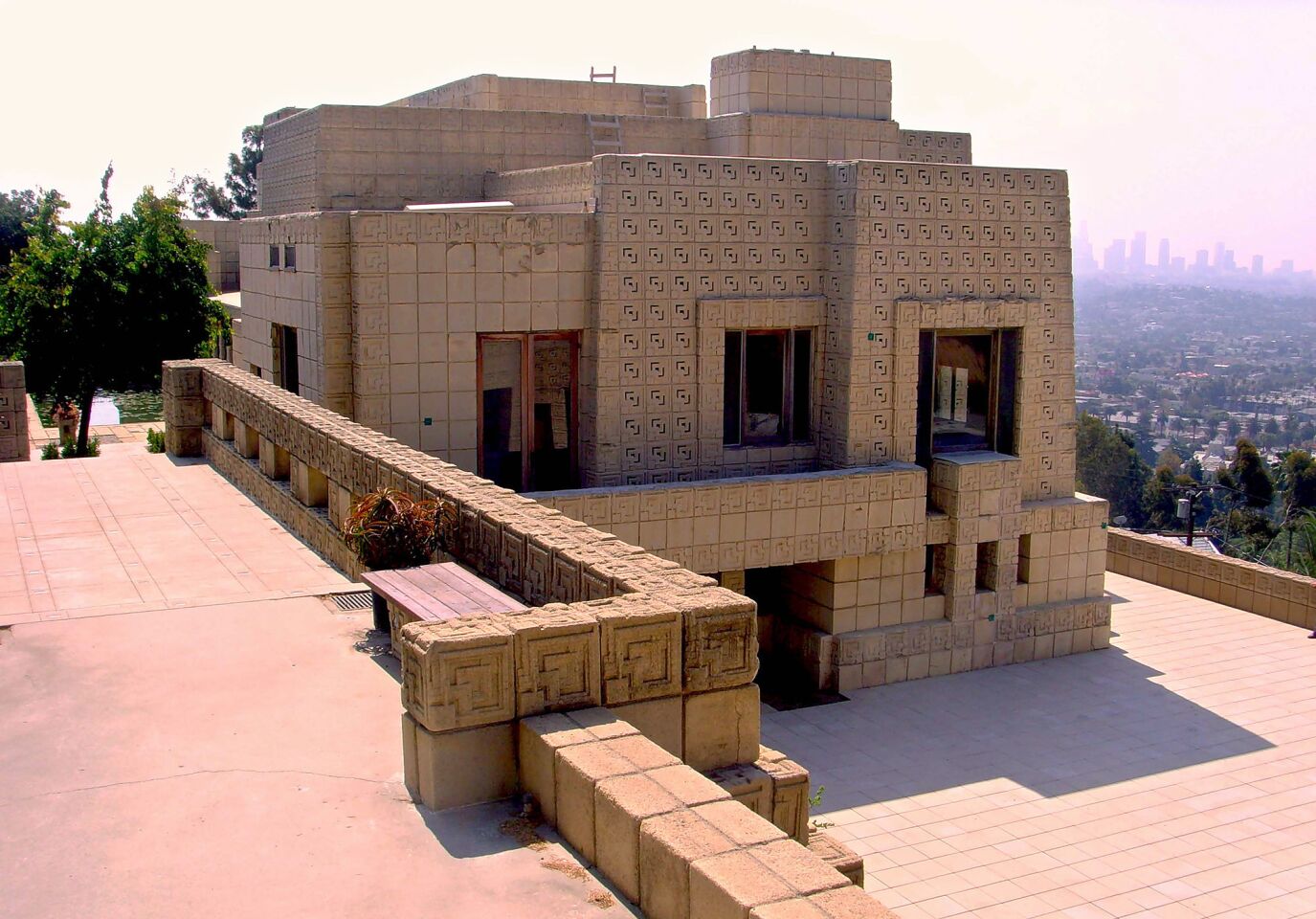 Frank Lloyd Wright, Los Feliz, 1924 The largest and loudest of Wright's four concrete-block houses in L.A., the Ennis House suggests what the greatest of Modernists would have done with a commission from the Maya Empire 700 years earlier. A heavy, elongated mass constructed of 16-by-16-inch concrete blocks (most textured with an ornate pattern) and sited majestically on a hilltop overlooking Griffith Park, the building appears to be more than a house -- an elegant fortification, perhaps, or a temple.