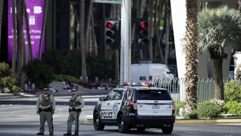 Police closed down part of the Las Vegas Strip after Saturday's shooting. (John Locher / Associated Press)