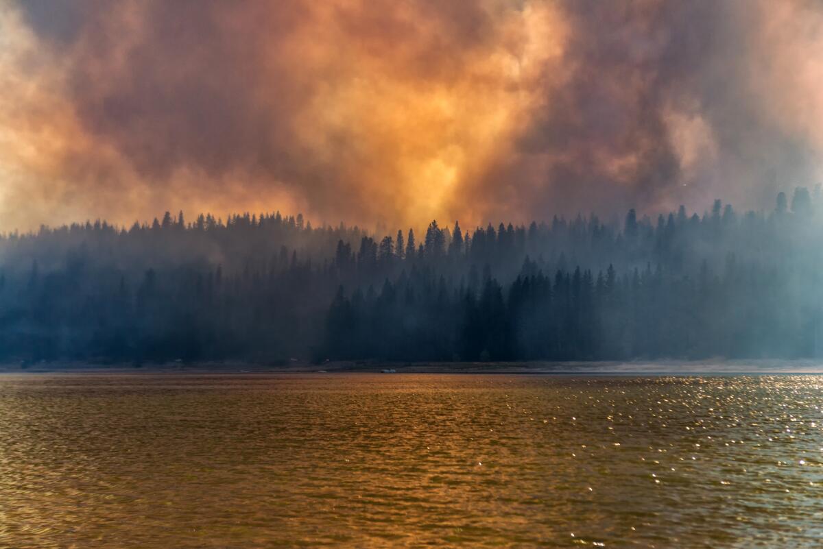 Wildfires choke the air with smoke near Yosemite in 2014. According to a report by the American Lung Assn., the state's drought increases the chance of fires, which worsen air quality in the short term.