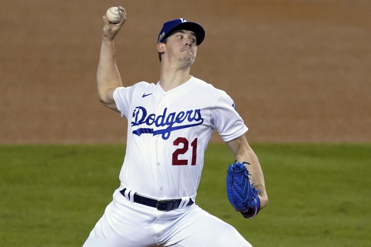 Dodgers starting pitcher Walker Buehler throws during a playoff win over the Milwaukee Brewers.