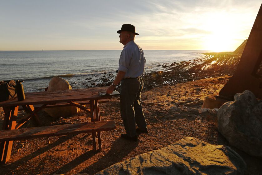 HOLLISTER RANCH, CA - JANUARY 23, 2019 Hollister Ranch attorney Steven Amerikaner watches the Winter sunset at Alegria creek in Hollister Ranch in Santa Barbara County January 23, 2019. At issue is an easement plan to make Cuarta Beach available to the public created when the YMCA owned a nearby parcel many years ago. The access plan has become a legal battle pitting Hollister Ranch homeowners against state agencies tasked with providing public access to California beaches. (Al Seib / Los Angeles Times)
