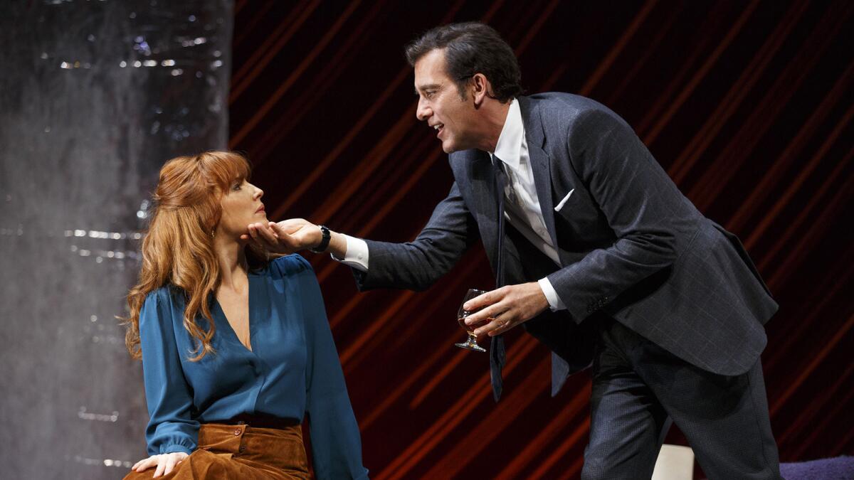 Kelly Reilly, left, and Clive Owen appear during a performance of Harold Pinter’s "Old Times." (Joan Marcus/Polk & Co. via AP)