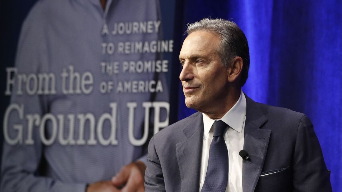 Former Starbucks CEO and Chairman Howard Schultz looks out at the audience during the kickoff event of his book promotion tour Monday in New York City.