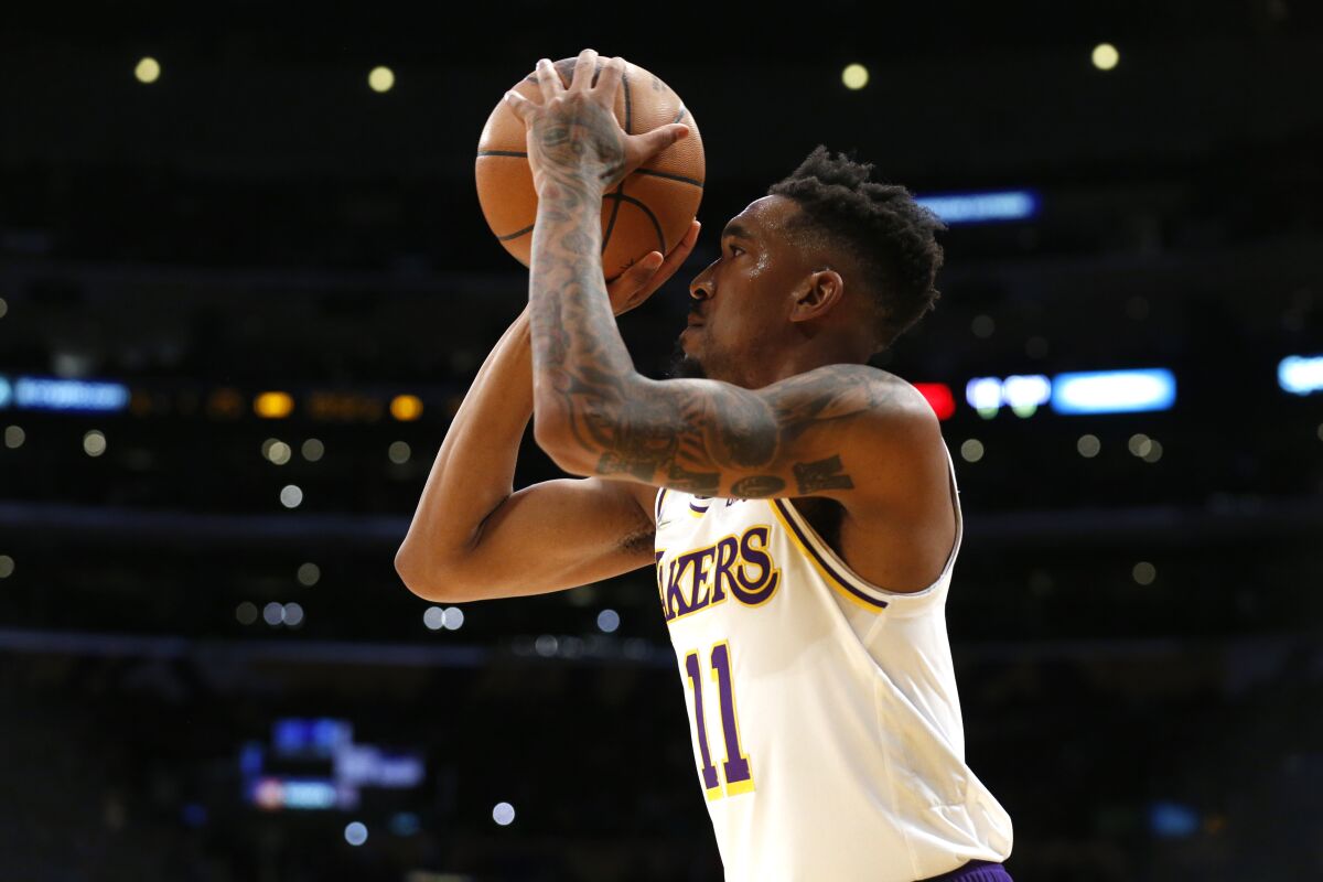 Lakers guard Malik Monk shoots against the Brooklyn Nets in the first half of a 122-115 Christmas loss at Crypto.com Arena.