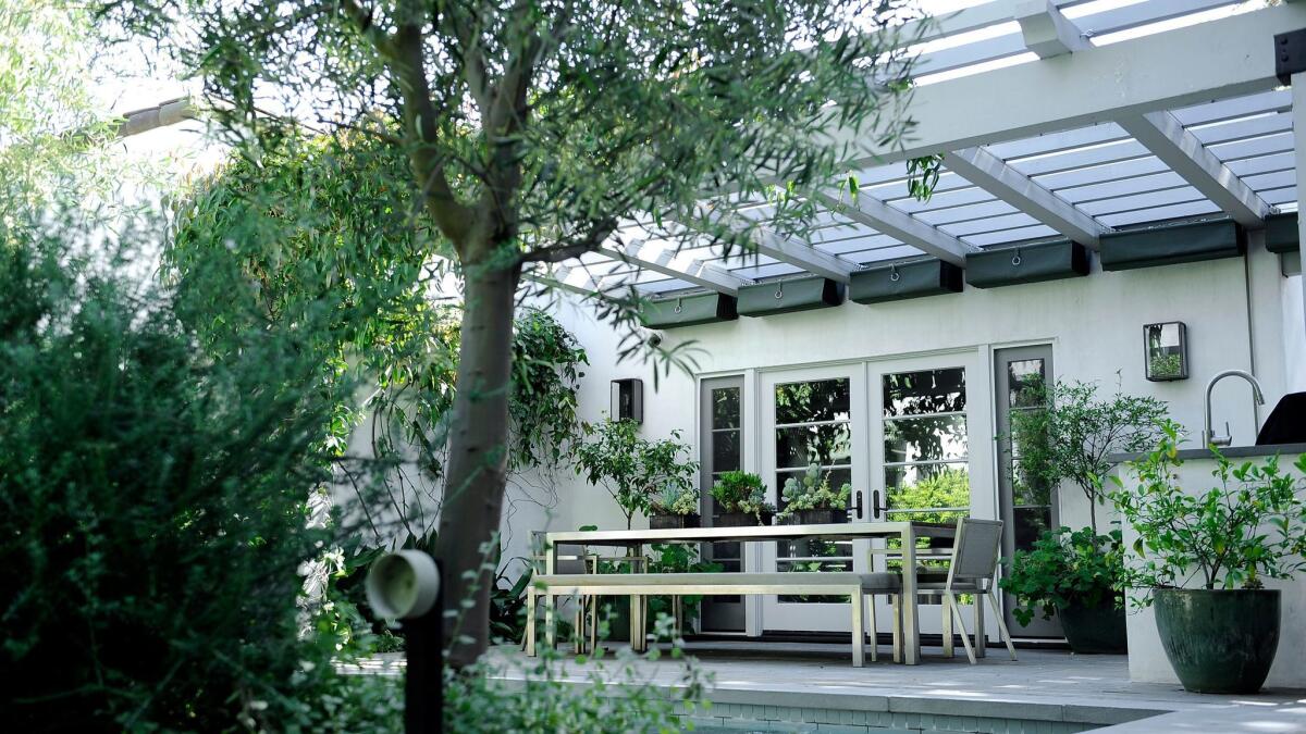 The family room opens to an outdoor dining room.