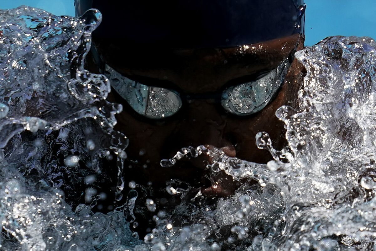 Reece Whitley competes in the men's 200-meter breaststroke final at the TYR Pro Swim Series swim meet April 10, 2021, in Mission Viejo, Calif. (AP Photo/Ashley Landis)