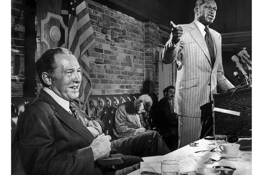 May 8, 1973: Los Angeles Councilman Thomas Bradley, right, criticizing Mayor Sam Yorty during their face-to-face debate at the Tarzana Chamber of Commerce.