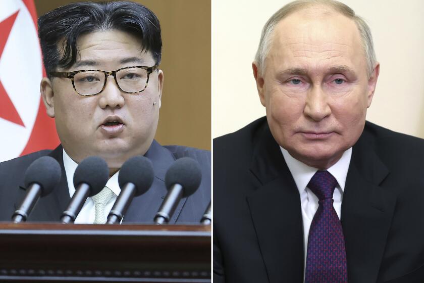FILE - This combination of photos shows North Korean leader Kim Jong Un, left, speaks at the Supreme People's Assembly in Pyongyang, North Korea, on Jan. 15, 2024 and Russian President Vladimir Putin delivers a video address to mark the 31st anniversary of the founding of the National Energy Giant Gazprom at the Novo-Ogaryovo state residence, outside Moscow, Russia, on Feb. 17, 2024. Putin has gifted Kim a Russian-made car for his personal use in a demonstration of their special relations, North Korea’s state media reported Tuesday, Feb. 20, 2024. (AP Photo, File)