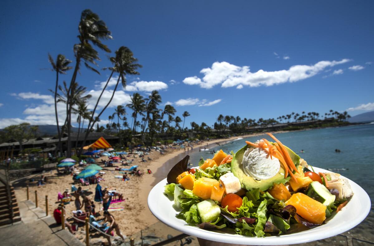 The chicken papaya salad, $14, is on the menu at the Sea House Restaurant located at the Napili Kai Beach Resort in Lahaina, Hawaii.