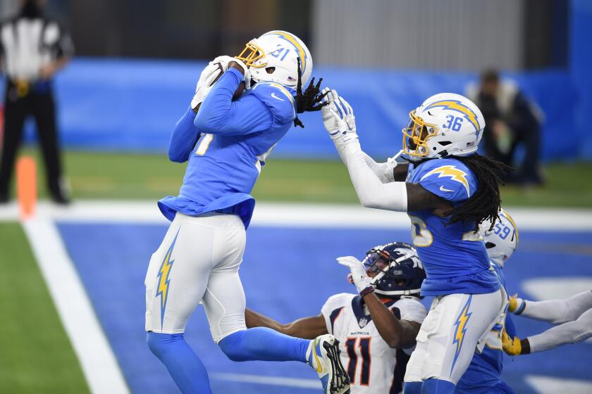 Mike Williams (81) intercepts a Drew Lock pass in the end zone to preserve a Chargers victory over the Denver Broncos.