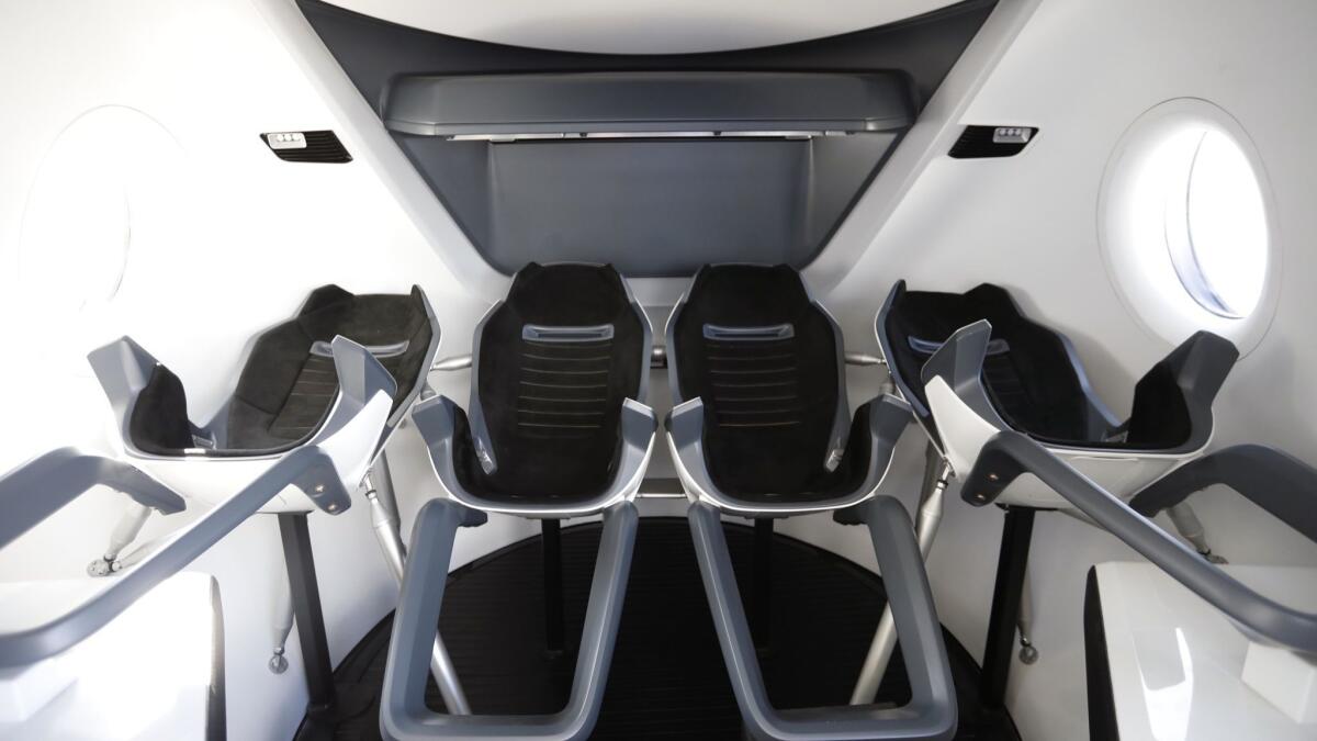 A mock-up of the interior of SpaceX's Crew Dragon capsule.