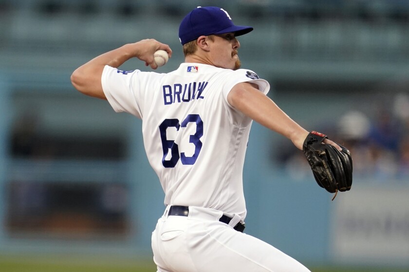 Dodgers starting pitcher Justin Bruihl winds up to pitch against the Pirates