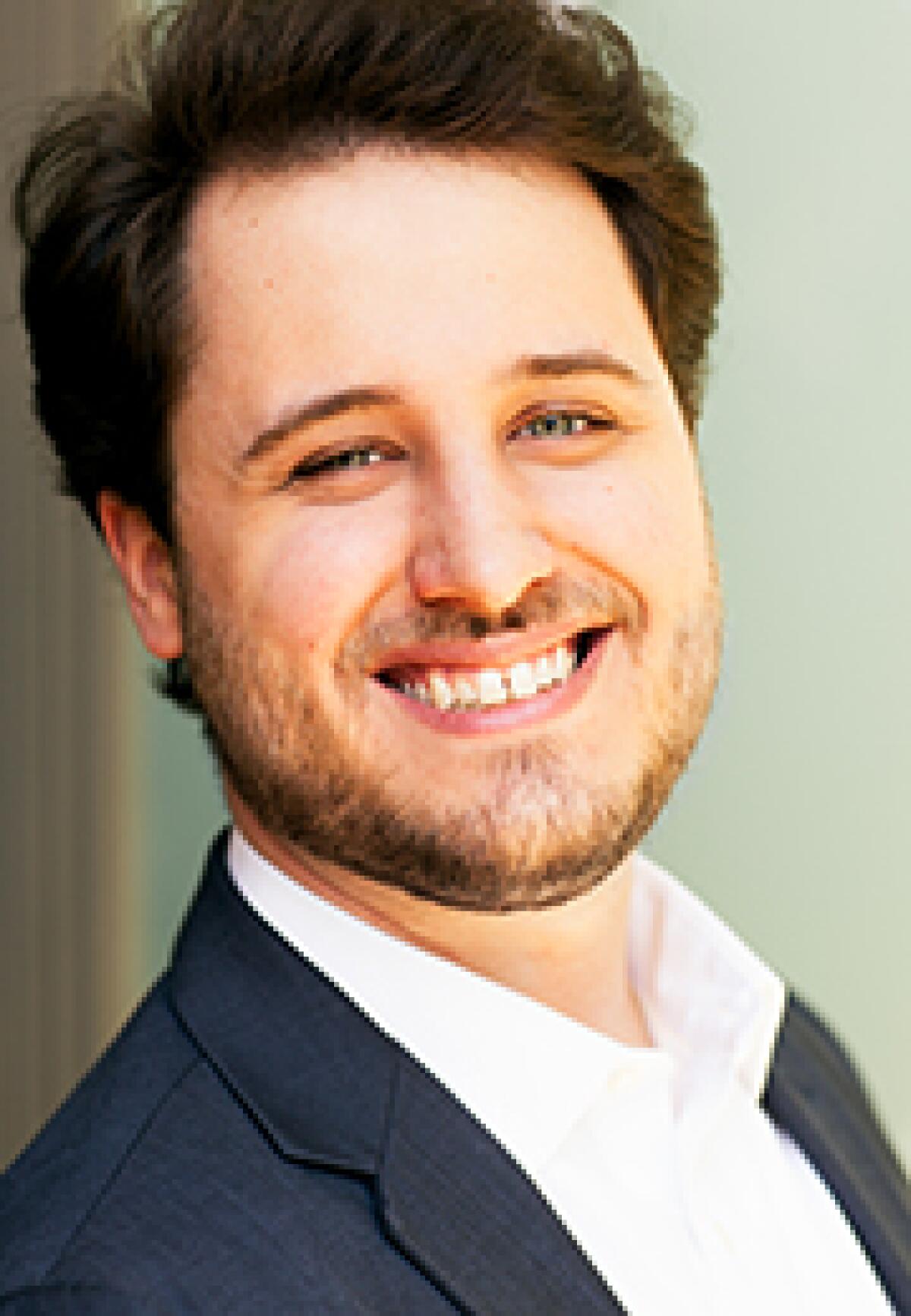 Tenor Carlos Enrique Santelli stars in San Diego Opera's "The Barber of Seville."
