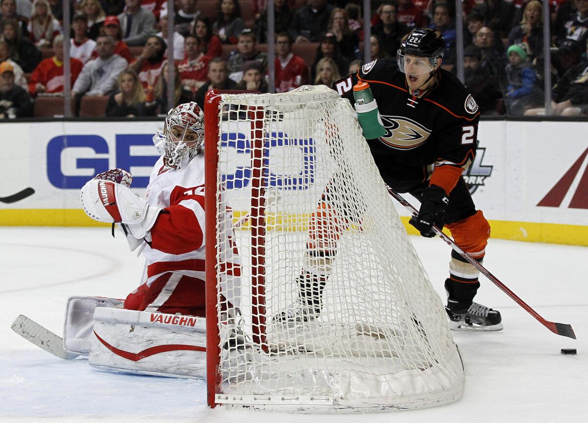 Ducks center Shawn Horcoff controls the puck behind Red Wings goalie Petr Mrazek during a Jan. 10 game at Honda Center in Anaheim.
