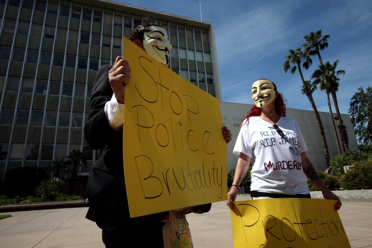 Protesters gather outside the Kern County Superior Court building in Bakersfield on Thursday in response to the death of David Sal Silva after he was beaten by Kern County sheriff's deputies.