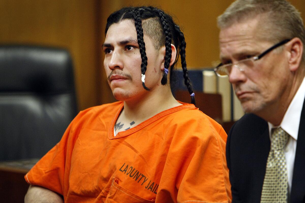 Moises Meraz-Espinoza in court with his attorney, Jonathan Roberts, in June.