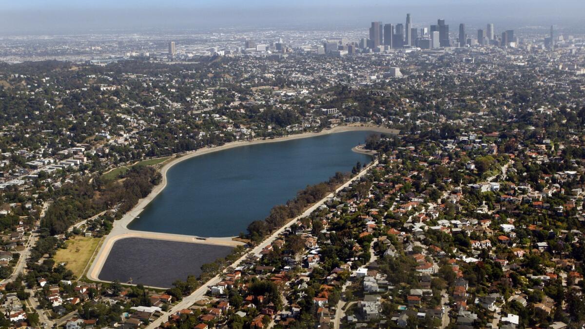 Aerial view of Silver Lake Reservoir with the smaller Ivanhoe Reservoir in the foreground and downtown Los Angeles in the distance on May 29, 2012.