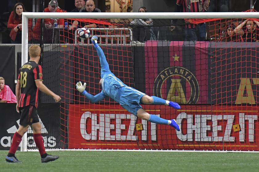 Atlanta United goalkeeper Brad Guzan (1) is not able to stop a goal by Toronto FC midfielder Nick DeLeon, not seen, during the second half of the MLS soccer Eastern Conference final Wednesday, Oct. 30, 2019, in Atlanta. Toronto FC won 2-1. (Hyosub Shin/Atlanta Journal-Constitution via AP)