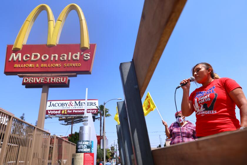 LOS ANGELES, CALIFORNIA - APRIL 16: McDonald’s employee Nidia Torres speaks at a rally of fast food workers and supporters for passage of AB 257, a fast-food worker health and safety bill, on April 16, 2021 in the Boyle Heights neighborhood of Los Angeles, California. The rally was held outside of a McDonald’s location where a worker lodged public health complaints and a wage theft complaint. Some fast food workers are on strike in Los Angeles County today in support of the bill. (Photo by Mario Tama/Getty Images)