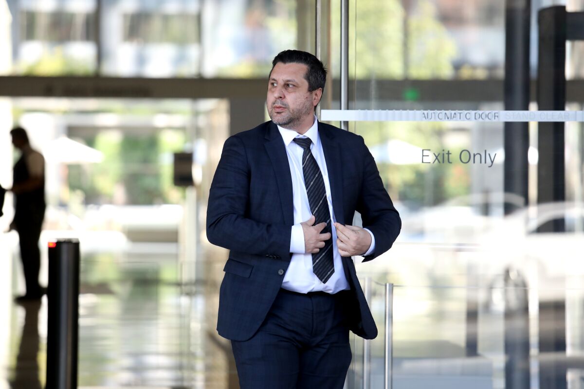 Richard Ayvazyan exits a federal courthouse in downtown Los Angeles during his trial in June.