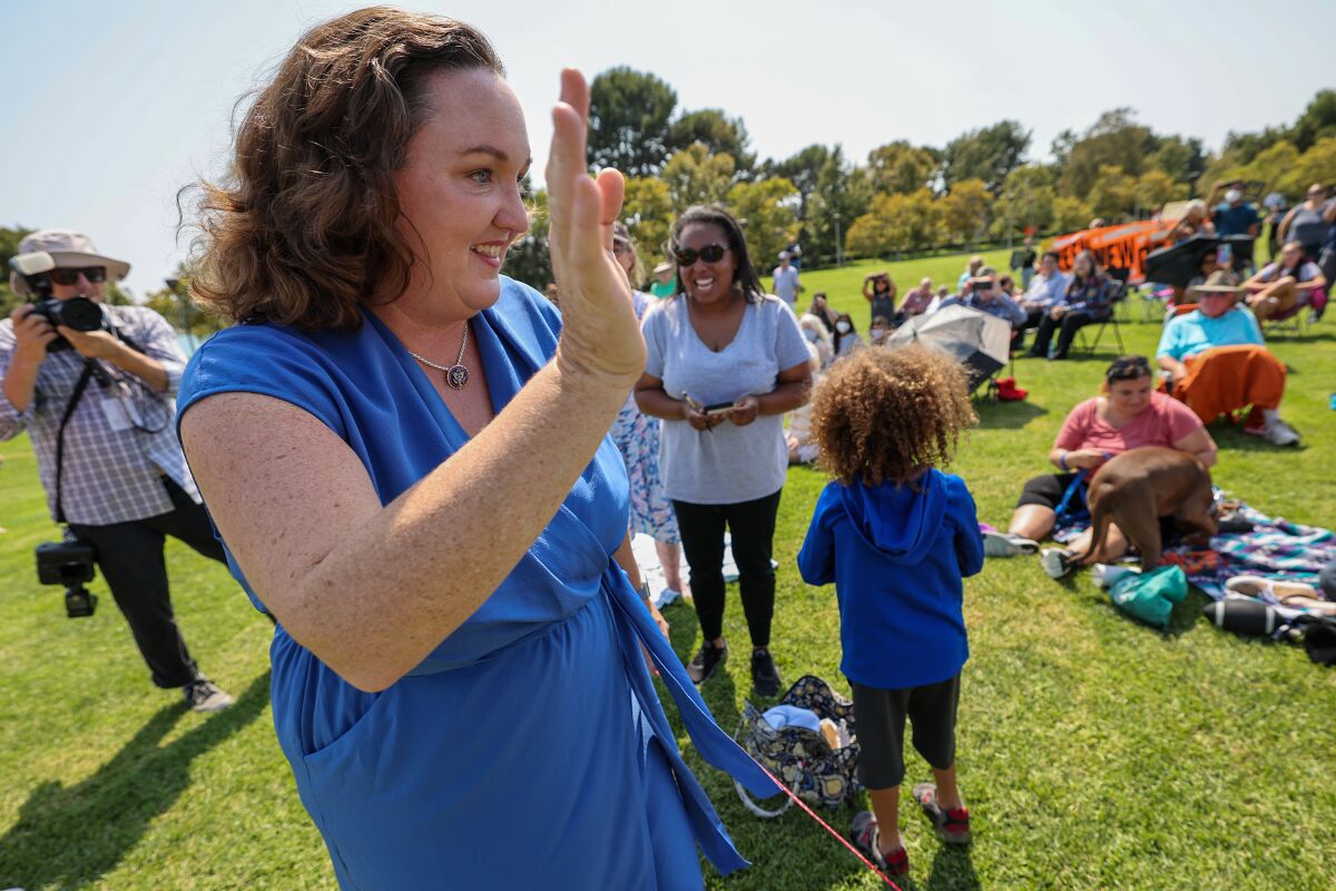 Rep. Katie Porter greets constituents at a town hall in an Irvine park