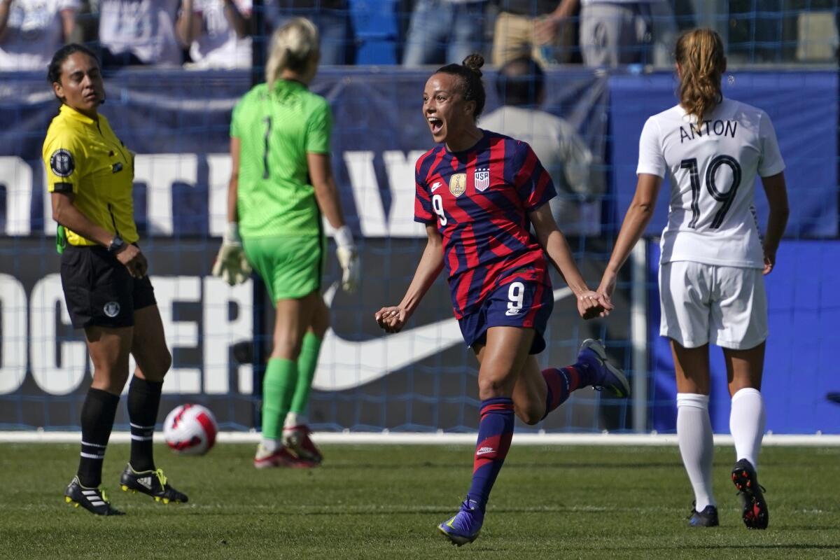 U.S. forward Mallory Pugh, second from right, celebrates after scoring a goal.