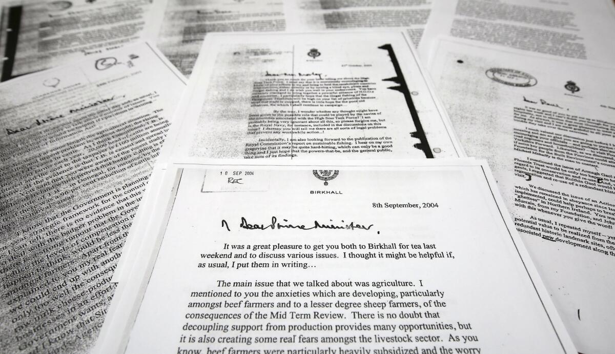 A copy of the letter that Prince Charles The Prince of Wales, wrote to the then-Prime Minister Tony Blair, front center, one of a series of his private letters to government ministers that were released on Wednesday.