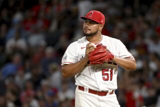 Los Angeles Angels relief pitcher Jaime Barria looks to the outfield after the Tampa Bay Rays.