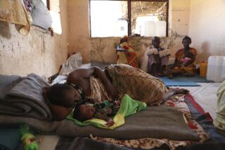 Ethiopian refugees rest in Qadarif region, easter Sudan, Friday, Nov 20, 2020. Thousands of Ethiopians fled the war in Tigray region into Sudan. (AP Photo/Marwan Ali)