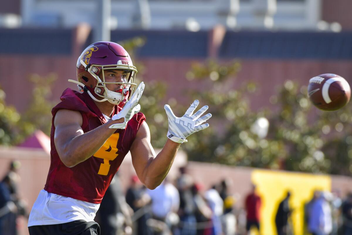USC wide receiver Bru McCoy catches a pass in practice.